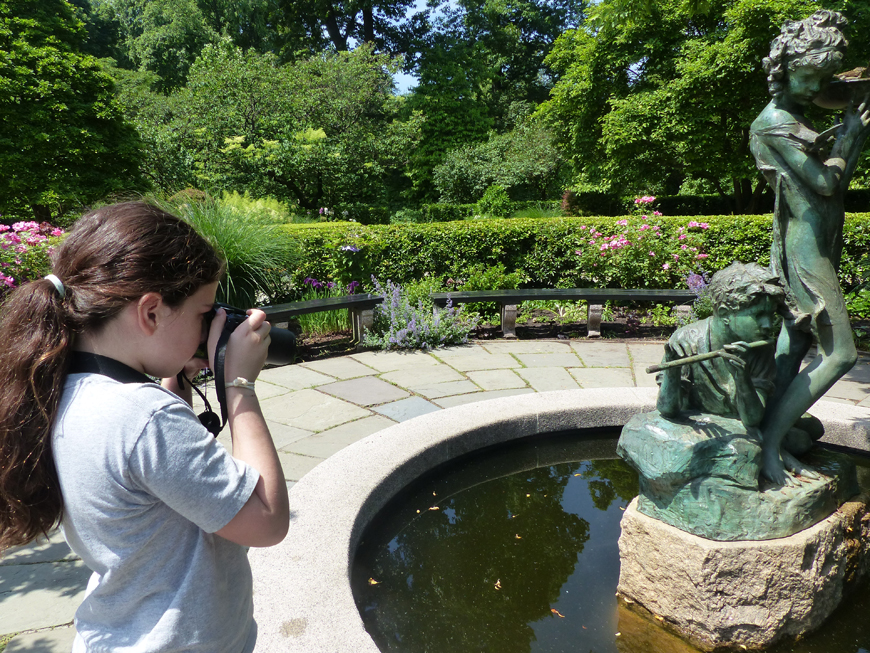 June camper photographing in the Conservatory Garden. Central Park, 2016.